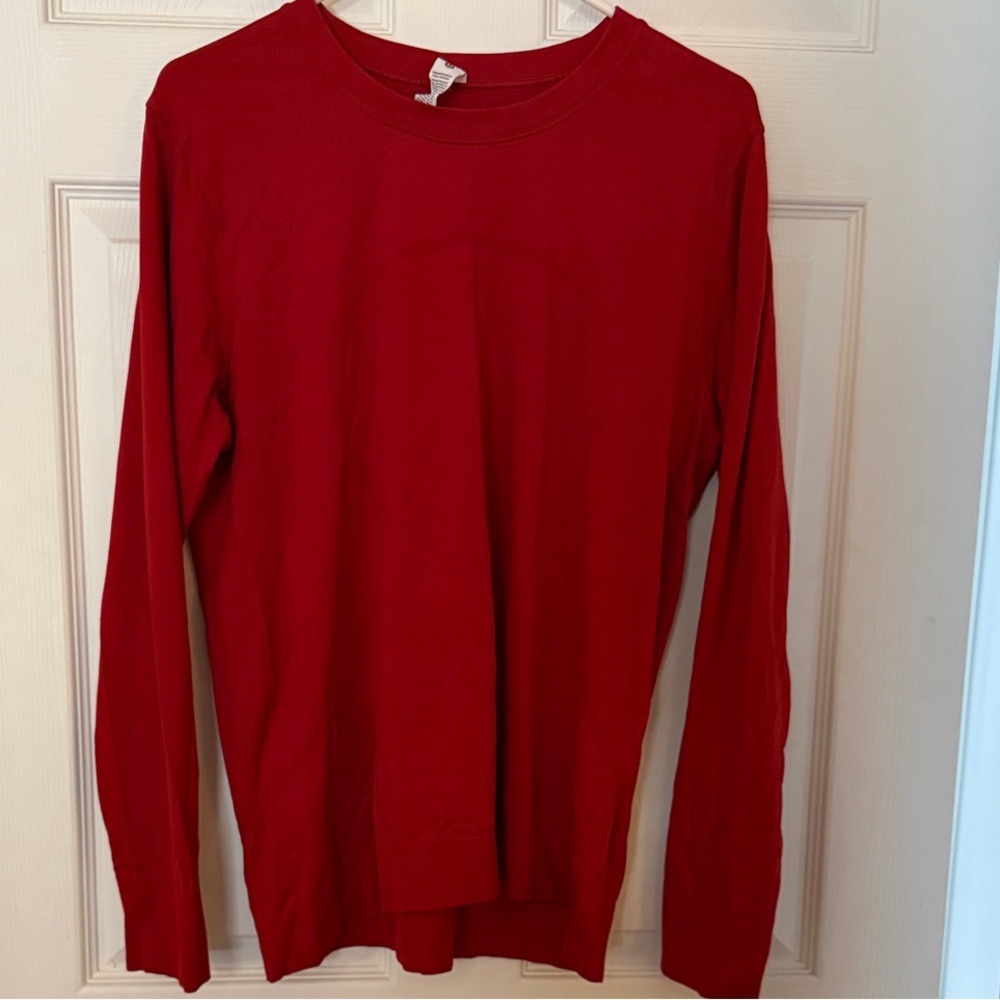 Lululemon women’s swiftly relaxed red long sleeve shirt.  Size 12